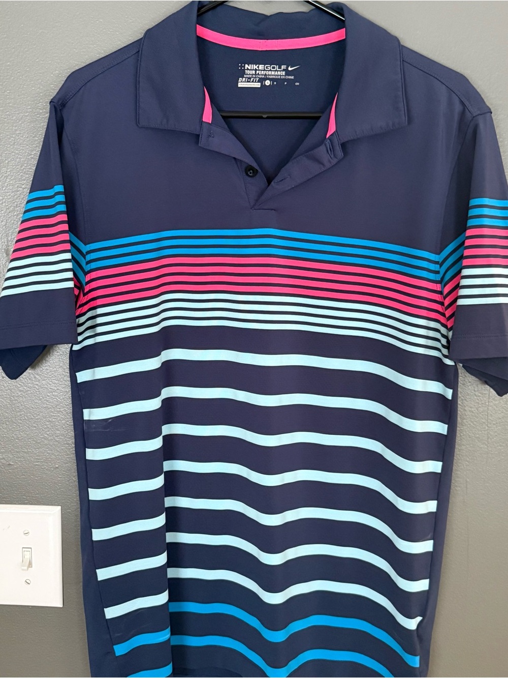 Nike Men’s Navy Polo with Pink and Light Blue Stripes